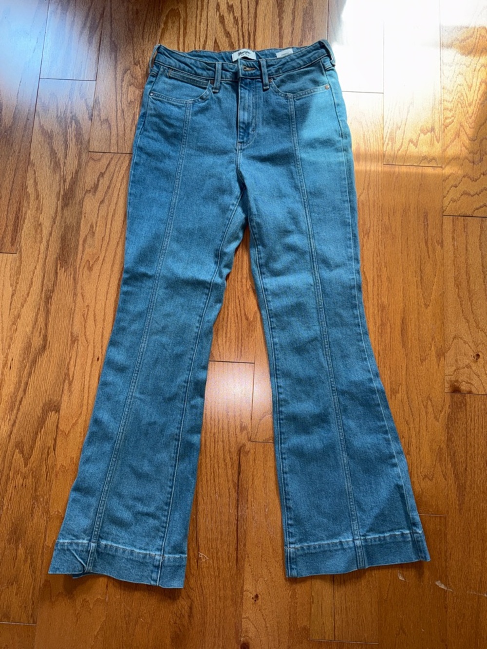 High-Rise Blue Flare Jeans with Front Panel Seams